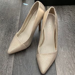 ALDO pointed toe pumps in gold
